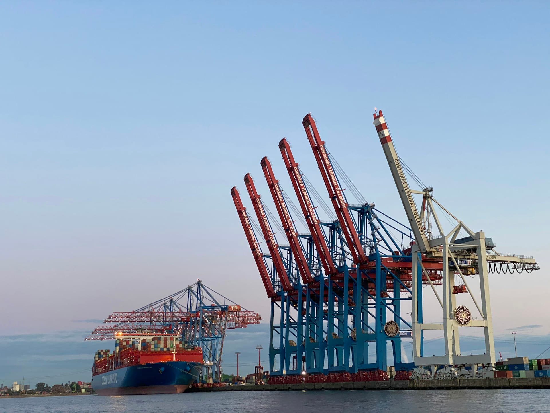 Silhouette of port cranes